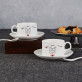 Rentier Zeichen - Zwei Tassen mit Untertasse Rentier Zeichen - Zwei Tassen mit Untertasse