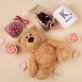 Set mit Tasse, Teddybär und Süßigkeiten für sie